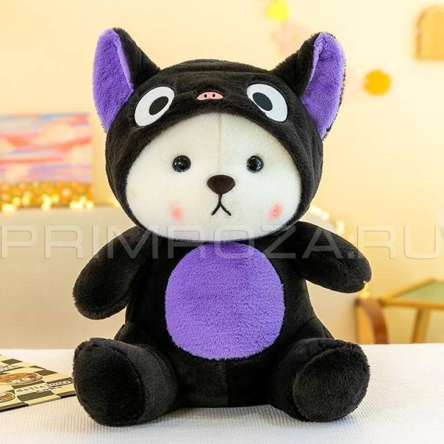 Teddy bear in a cat costume 